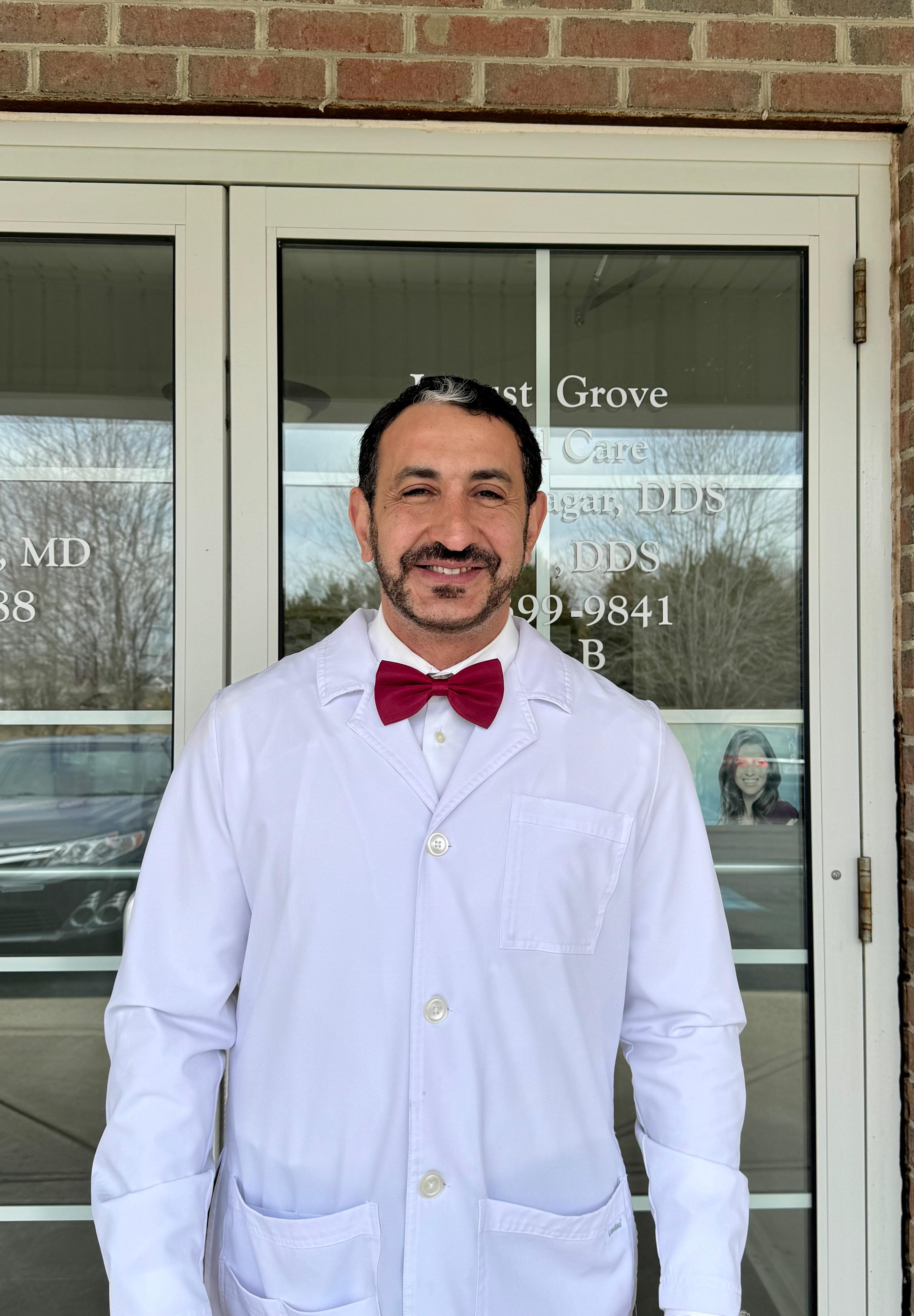 Smiling professional in navy blazer